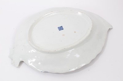 Lot 157 - A Worcester cabbage leaf shaped dish, with flowers on a blue scale ground, circa 1770