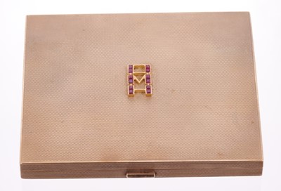 Lot 528 - Art Deco 9ct gold cigarette case with calibre cut ruby initials D.M.H. And engine turned decoration, sponsor's mark R&R, London 1939. Approximately 91mm x 78mm.