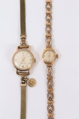 Lot 639 - Two ladies 9ct gold cased wristwatches, the Certina wristwatch on 9ct gold bracelet and the Cyma gold cased wristwatch on plated bracelet.