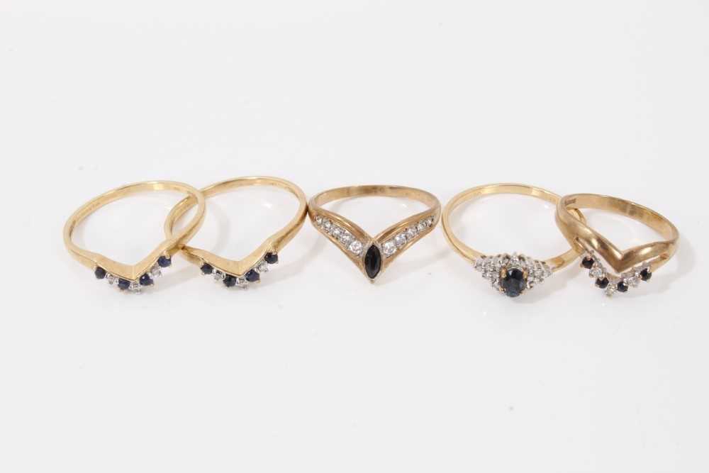 Lot 87 - Five 9ct gold blue gem stone dress rings