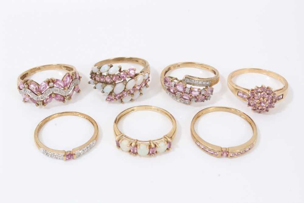 Lot 88 - Seven 9ct gold pale pink gem stone dress rings