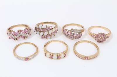 Lot 88 - Seven 9ct gold pale pink gem stone dress rings