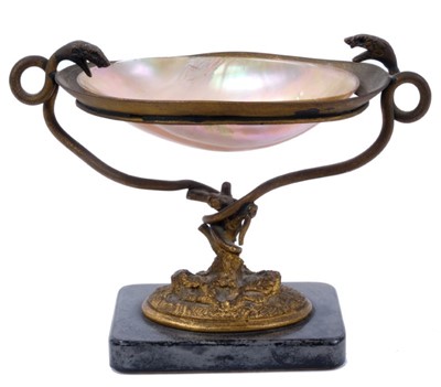 Lot 770 - 19th century Grand Tour decorative table salt, with abalone shell raised on twin serpent supports and oval naturalistic plinth on rounded rectangular marble base, 18cm wide