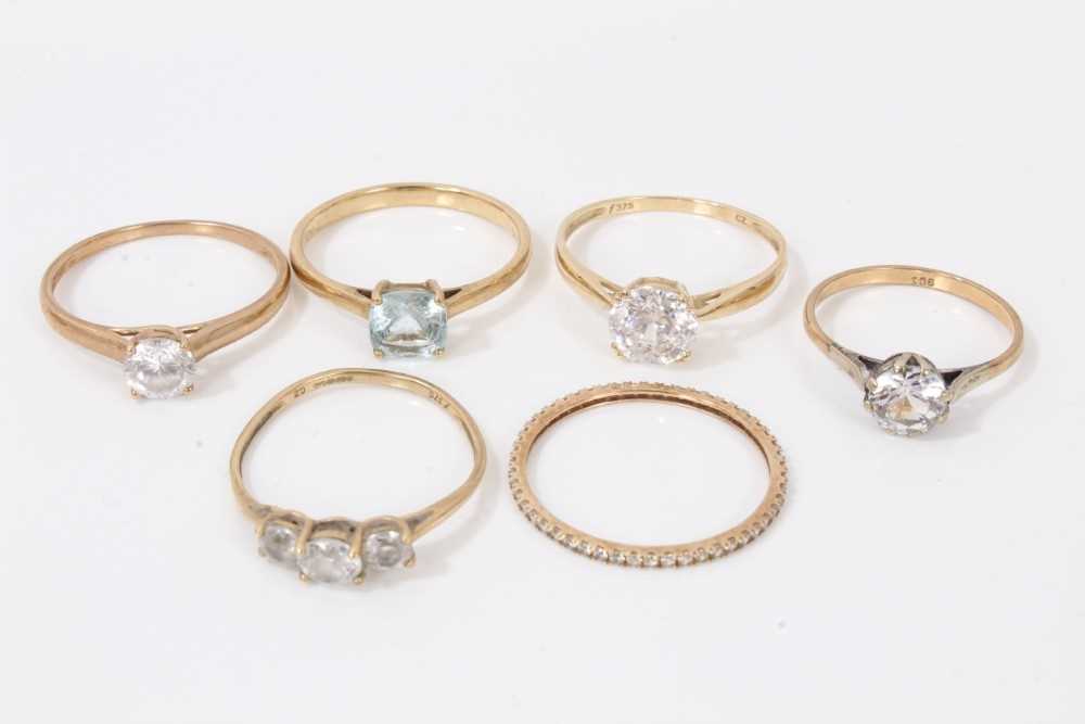 Lot 93 - Six 9ct gold synthetic stone dress rings