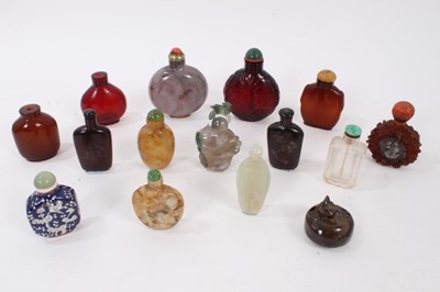 Lot 781 - Large collection of Chinese snuff bottles, in hardstone, glass and wood. (15)