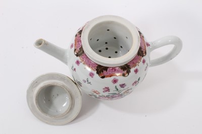 Lot 140 - Chinese famille rose export porcelain teapot and strainer, Qianlong period, decorated with floral sprays and patterned borders, 15cm high including cover