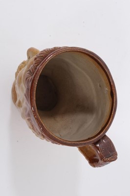 Lot 162 - 19th century salt glazed stoneware Bacchus mask mug