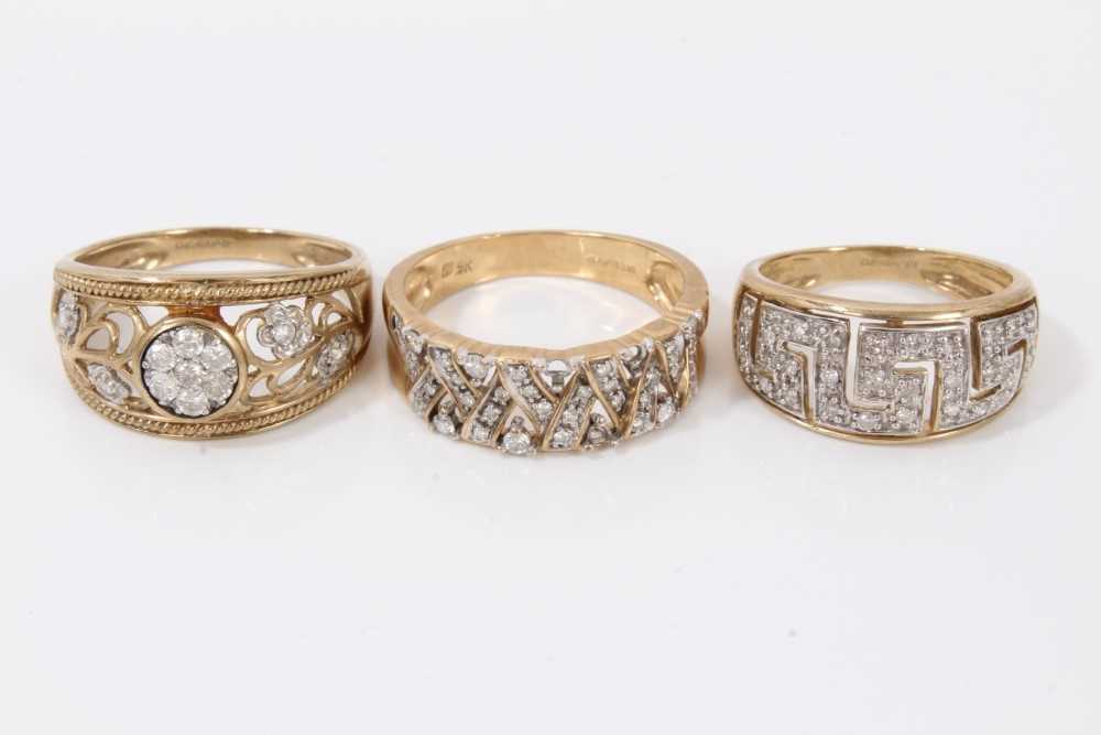 Lot 96 - Three 9ct gold diamond set pierced band rings