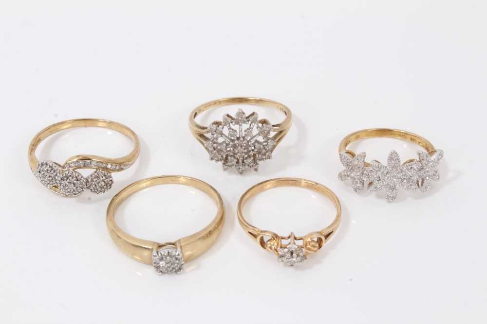 Lot 97 - Five 9ct gold diamond cluster rings