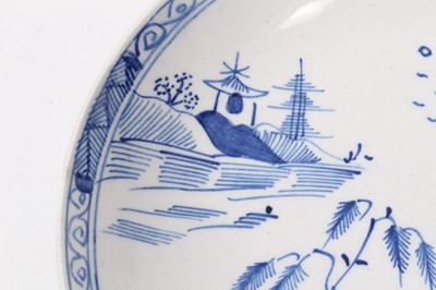 Lot 165 - A Lowestoft blue and white saucer, circa 1790