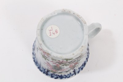 Lot 188 - A Worcester feather moulded coffee cup, painted in Chinese style with figures in a garden, circa 1755-57