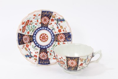 Lot 204 - A Worcester Queens pattern teacup, circa 1770, and a later saucer