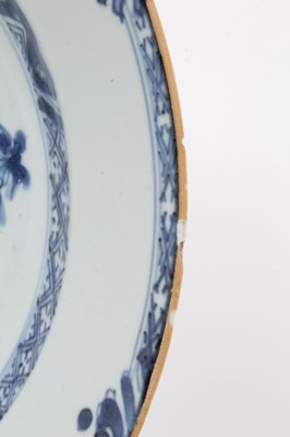 Lot 145 - Nine Chinese blue and white export dishes, 18th century, the largest measuring 31.5cm diameter, the rest approx 22.5cm