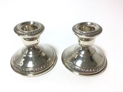 Lot 354 - Pair contemporary sterling silver dwarf candlesticks