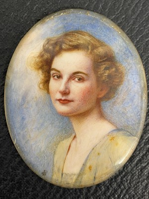 Lot 70 - English School, circa 1920, miniature portrait on ivory depicting a young woman
