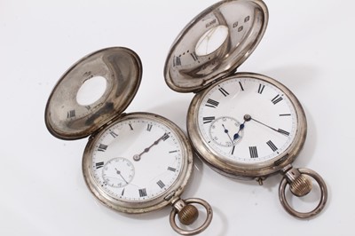 Lot 114 - Two silver cased half hunter pocket watches and three silver fob watches