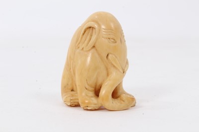 Lot 894 - Japanese carved ivory netsuke, in the form of an elephant, faint signature