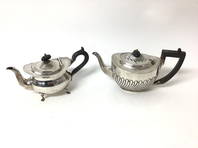 Lot 455 - Two silver teapots