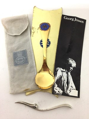 Lot 454 - Georg Jensen silver gilt year spoon in original bag and case, together with a silver lobster pick