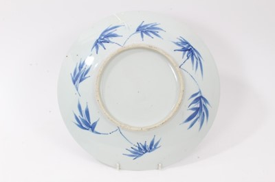 Lot 171 - Chinese blue and white dish, 19th century, painted with a landscape, 29.5cm diameter, together with a smaller 18th century export dish (2)
