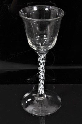 Lot 172 - 18th century wine glass, ogee bowl with flared rim, opaque twist stem and conical foot, 15.25cm high