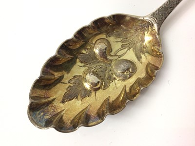 Lot 451 - Four Georgian silver berry spoons