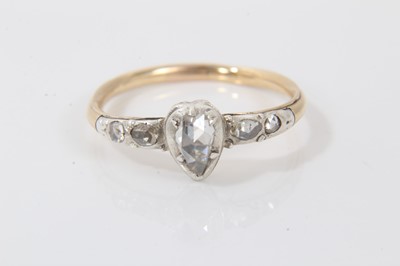 Lot 559 - Mid 18th century Georgian diamond heart-shape ring with a central rose-cut pear shape diamond in a heart shape silver collet setting, flanked by further rose cut diamonds to the shoulders, the gold...