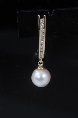 Lot 299 - Pair 14ct gold cultured pearl and diamond pendant earring