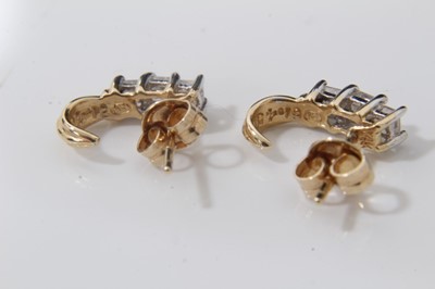 Lot 300 - Pair 14ct gold diamond earrings