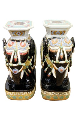 Lot 1312 - Pair of oriental pottery garden seats, in the form of elephants, 59cm high