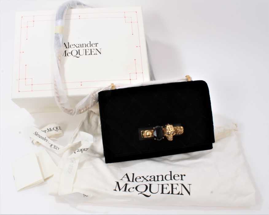 Lot 2130 - Designer Alexander McQueen Knuckle Duster Handbag in quilted black velvet, skulls and gilt chain.  In original box with soft bag, ribbon ties and care leaflets. Unused.