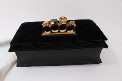 Lot 2130 - Designer Alexander McQueen Knuckle Duster Handbag in quilted black velvet, skulls and gilt chain.  In original box with soft bag, ribbon ties and care leaflets. Unused.