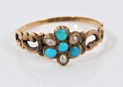 Lot 562 - Early Victorian turquoise and seed pearl forget-me-not ring with central flower motif, pierced gold scroll shoulders on tapered shank. Ring size O.