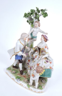 Lot 193 - Vienna porcelain group, late 19th/early 20th century, in the form of a courting couple and two putti, beehive mark to base, 25.5cm high