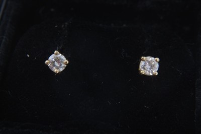 Lot 123 - Diamond three stone ring, 9ct gold emerald and diamond seven stone ring and pair diamond stud earrings