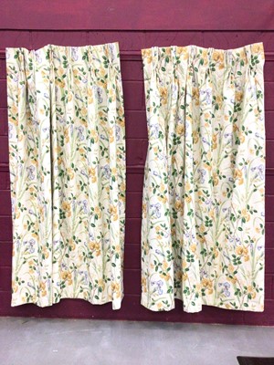 Lot 1501 - Three pairs of yellow and blue floral interlined curtains with green foliage on cream ground, the pinch plated tops measuring approximately 102cm x 210cm drop and 122cm x 234cm drop