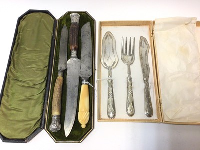 Lot 379 - Three Victorian Sheffield steel carving knives and a Continental silver fish serving set