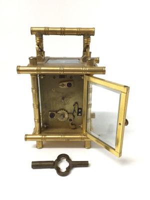 Lot 702 - Victorian miniature bamboo style carriage clock