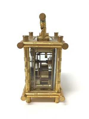 Lot 702 - Victorian miniature bamboo style carriage clock