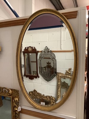 Lot 1421 - 19th century oval gilt mirror with beaded decoration