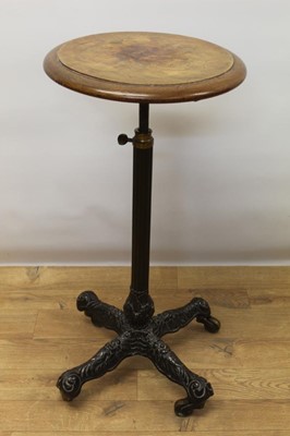 Lot 1402 - Unusual 19th century circular burr walnut table standing on a telescopic, metamorphic base, with gilt collar beneath, the decorative iron base standing on large brass casters