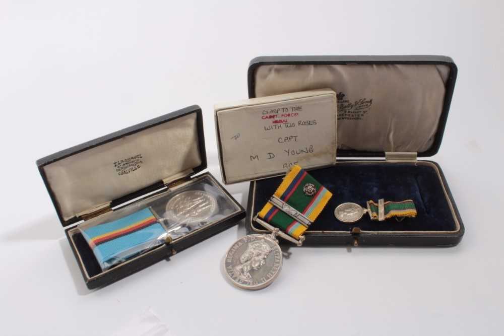 Lot 833 - Elizabeth II Cadet Forces medal with bar and silver rosette named to LT. M.D. Young. ACF. together with miniature medal, original box of issue and Unofficial British Forces Germany medal