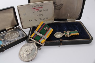 Lot 833 - Elizabeth II Cadet Forces medal with bar and silver rosette named to LT. M.D. Young. ACF. together with miniature medal, original box of issue and Unofficial British Forces Germany medal