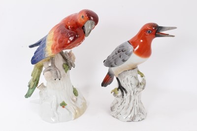 Lot 256 - Capodimonte figure of a parrot, together with a further ceramic figure of a woodpecker, the parrot measuring 29.5cm high