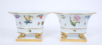 Lot 258 - Pair of Herend porcelain jardinieres, of oval form, decorated with fruit and flowers, with lion's paw feet on rectangular bases, model number 6455, 15cm high