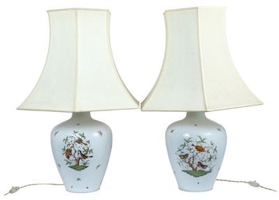 Lot 260 - Large pair of Herend porcelain lamps, with moulded basket weave surface, decorated with birds and insects, model number 6987, 50cm high without shades