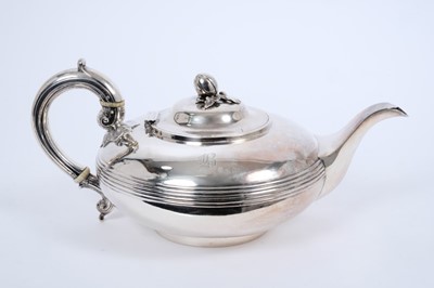 Lot 305 - Victorian silver tea pot of compressed form