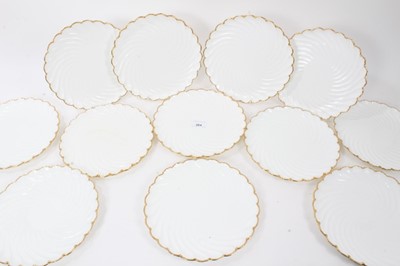 Lot 264 - Set of twelve Coalport plates, spiral fluted with gilt rims, 22cm diameter