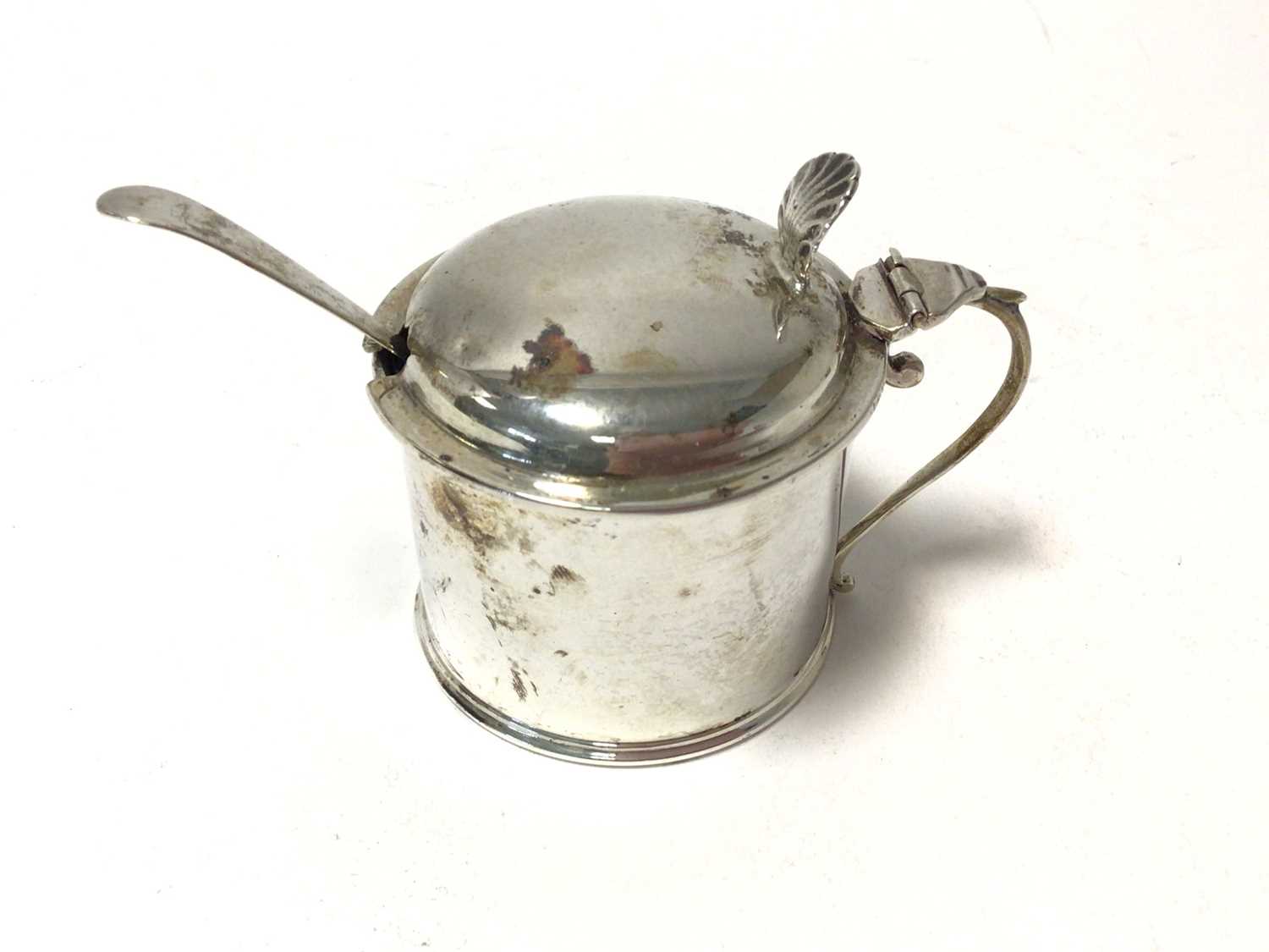 Lot 226 - Edwardian silver drum mustard with scroll handle and hinged domed cover