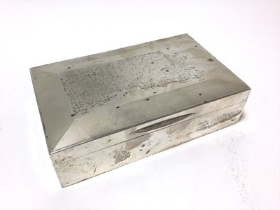 Lot 311 - 1930s silver cigarette box of rectangular form, with hinged cover and engine turned decoration